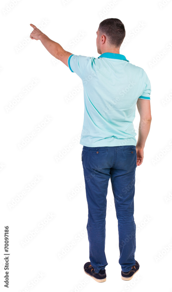 Back view of pointing young men in shirt and jeans. Back view of pointing young men in shirt and jeans.