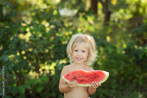child and watermelon