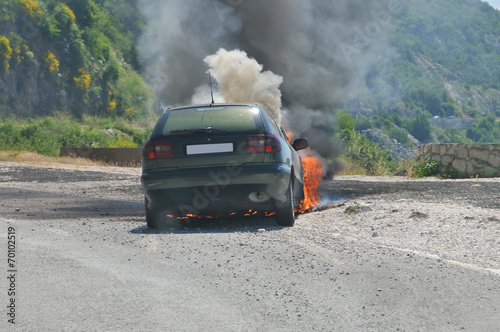 Burning car on highway © sevaljevic