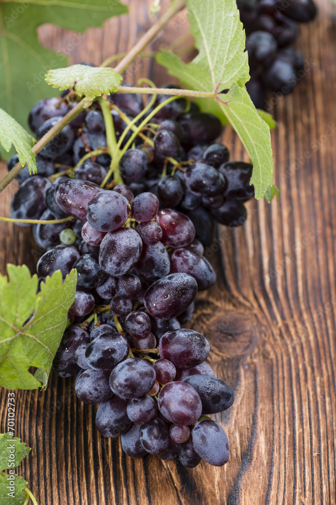 Blue Grapes (on wooden background) Blue Grapes (on wooden background)