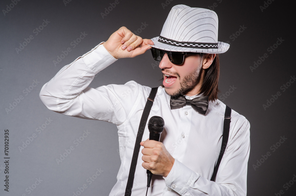 Funny singer with microphone at the concert Funny singer with microphone at the concert