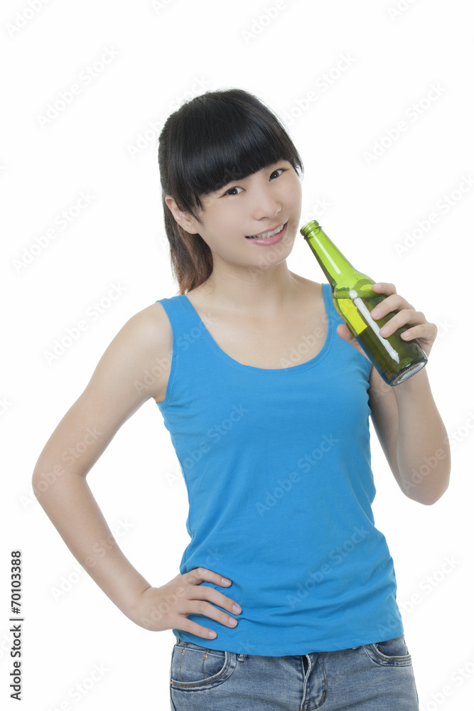 Asian woman enjoying a beer isolated on white Asian woman enjoying a beer isolated on white