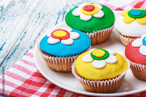 cupcakes decorated with colorful mastic