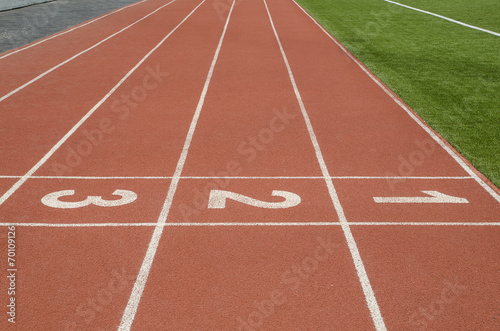 1 2 3 number on race track in football stadium. © tkroot