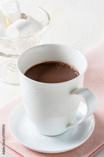 Cup of hot chocolate on a white table