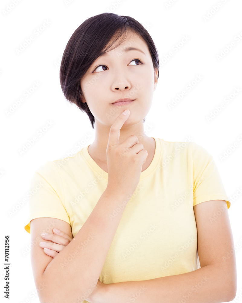young girl thinking and looking up isolated on white young girl thinking and looking up isolated on white
