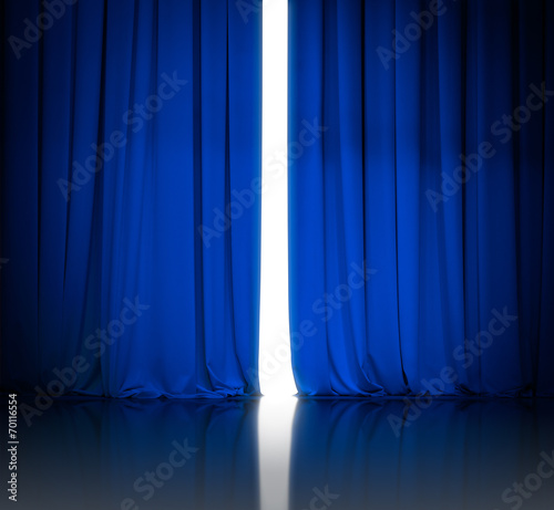 blue theater or cinema curtains slightly open and white light be