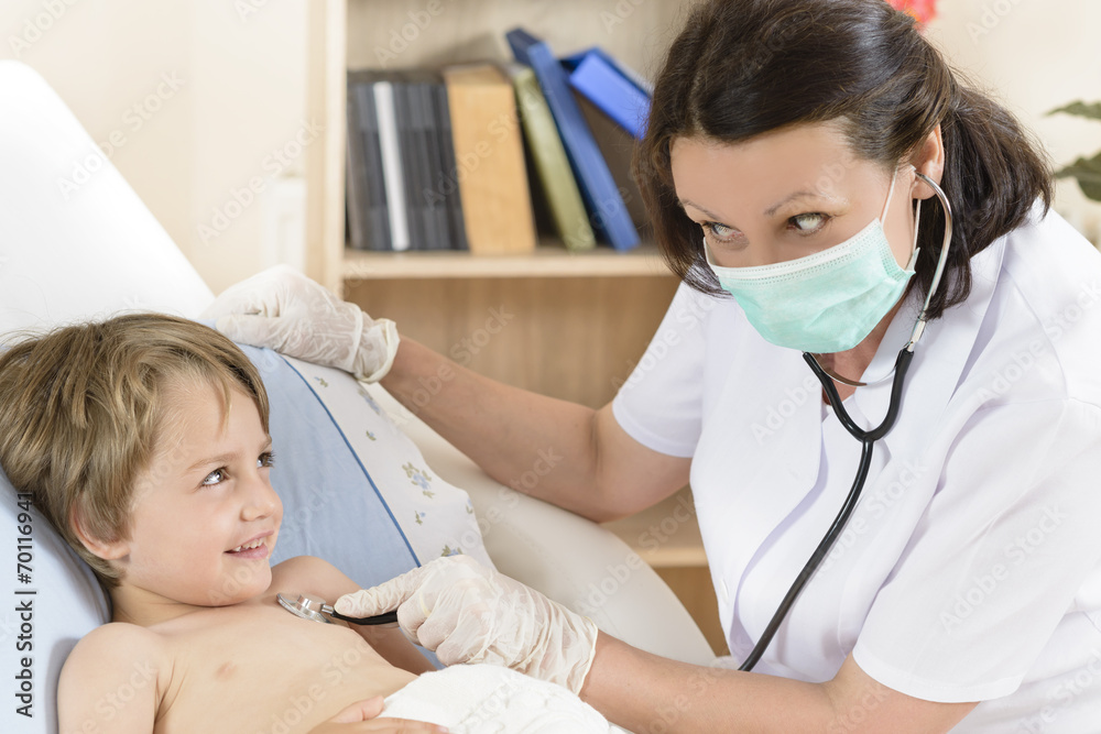 Doctor consulting a little boy Doctor consulting a little boy