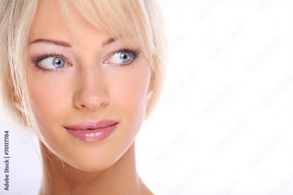 Close up portrait of beautiful young woman face. Isolated on wh Close up portrait of beautiful young woman face. Isolated on wh