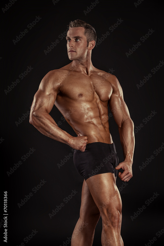 Strong Athletic Man Fitness Model Torso showing big muscles