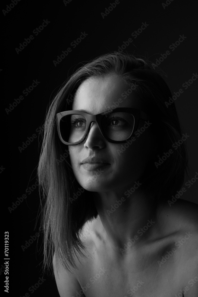 Portrait of young pretty woman smiling in fashionable eyeglasses Portrait of young pretty woman smiling in fashionable eyeglasses