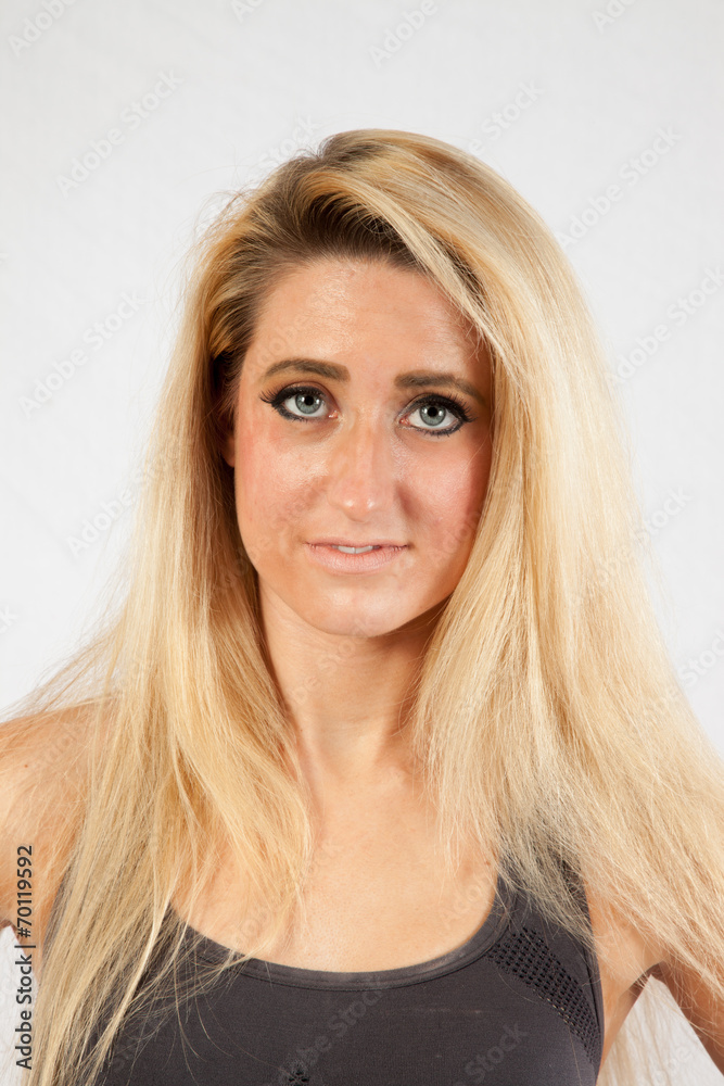 blond woman smiling at the camera blond woman smiling at the camera
