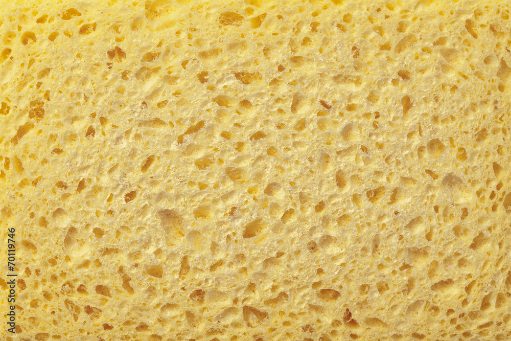 yellow pierced sponge texture background surface yellow pierced sponge texture background surface