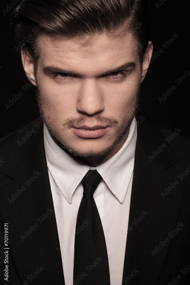 handsome business man looking at the camera handsome business man looking at the camera