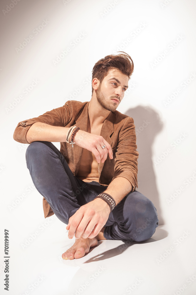 man resting on the floor and thinking man resting on the floor and thinking