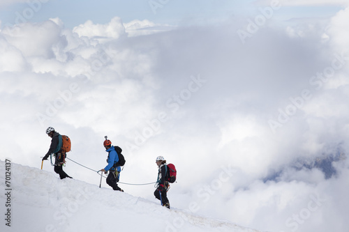 alpinisti in cordata sul Monte Bianco photo