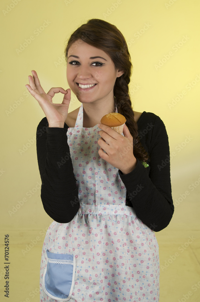 beautiful young woman chef cook baker wearing apron