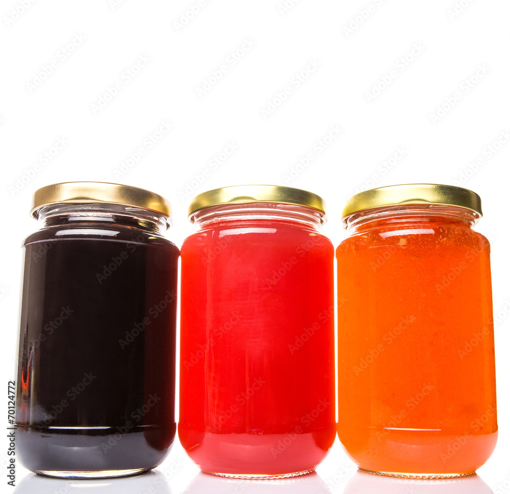 Blueberry, strawberry and orange fruit open lid bottled jam Blueberry, strawberry and orange fruit open lid bottled jam