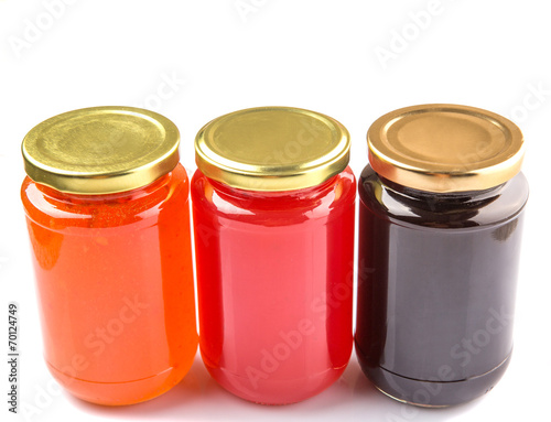 Blueberry, strawberry and orange fruit open lid bottled jam 
