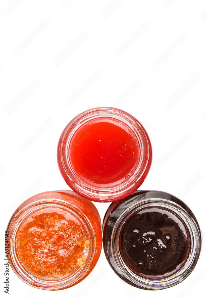 Blueberry, strawberry and orange fruit open lid bottled jam 