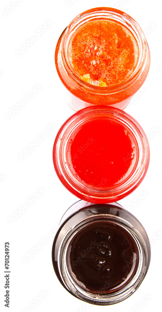 Blueberry, strawberry and orange fruit open lid bottled jam 