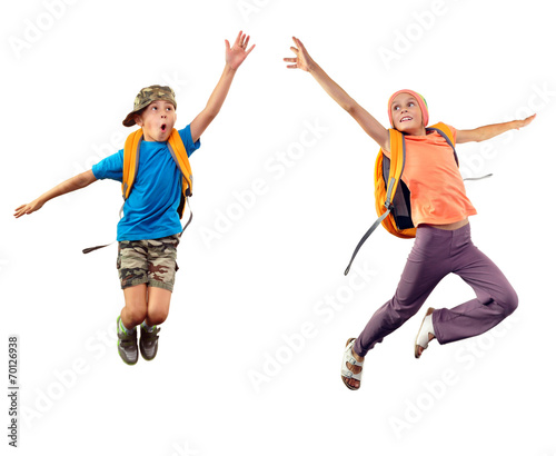 jumping children reaching something together