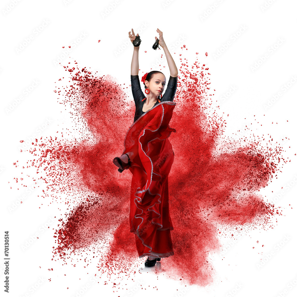 Fototapeta premium young woman dancing flamenco against explosion