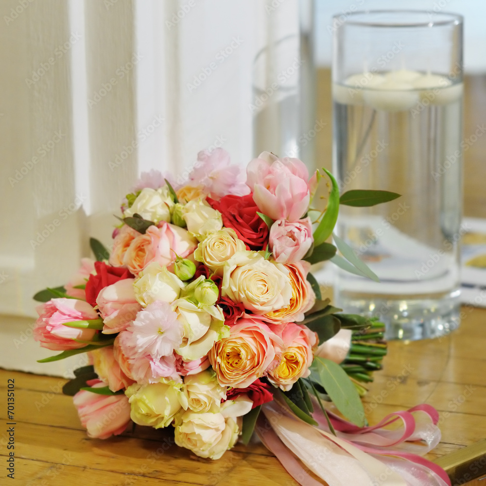 Multicolored wedding bouquet with silken ribbons Multicolored wedding bouquet with silken ribbons