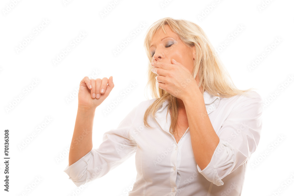 Sleepy tired woman yawning covering mouth with hand Sleepy tired woman yawning covering mouth with hand