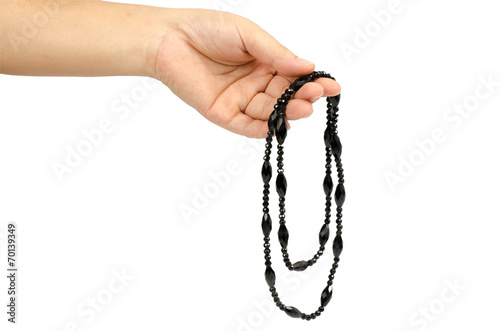 Necklace in woman's hand