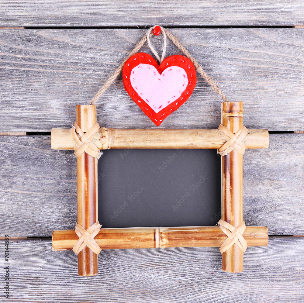 Rectangular chalkboard on wooden background Rectangular chalkboard on wooden background