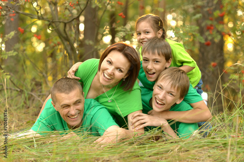 Family in green jersey