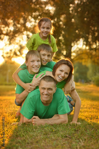 Family in green jersey
