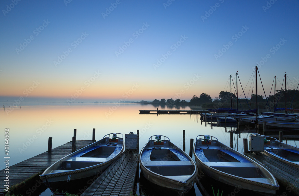 Tranquil dawn at a small marina.