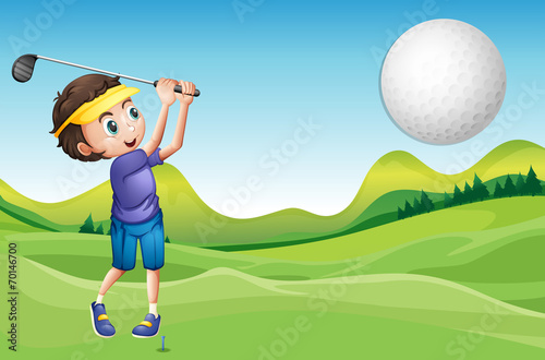 Boy playing golf
