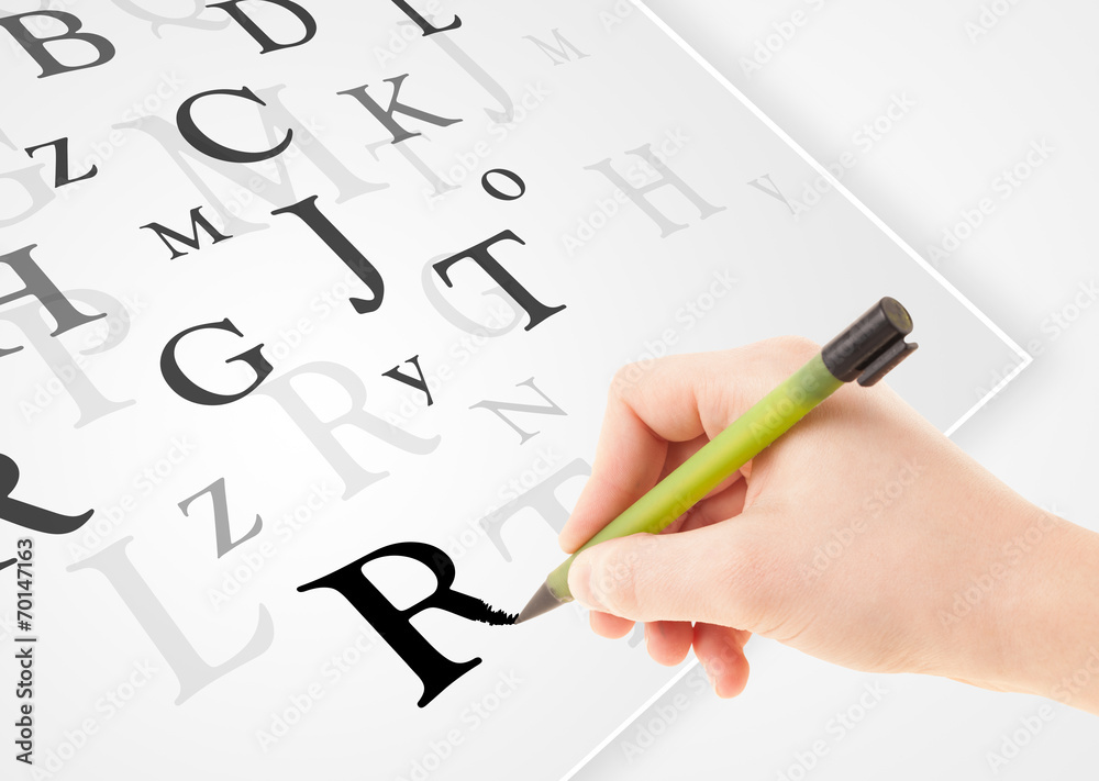 Hand writing various letters on white plain paper Hand writing various letters on white plain paper