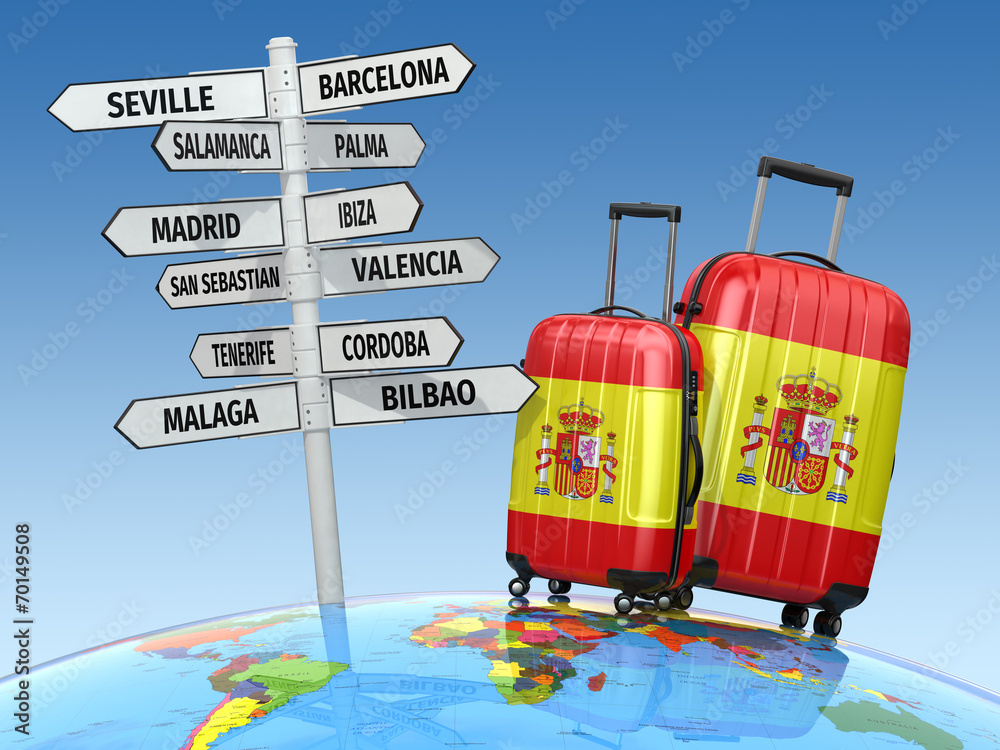 Travel concept. Suitcases and signpost what to visit in Spain. - obrazy, fototapety, plakaty 