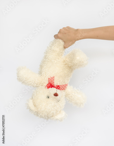 asian teen holding a  bear doll. © tropper2000