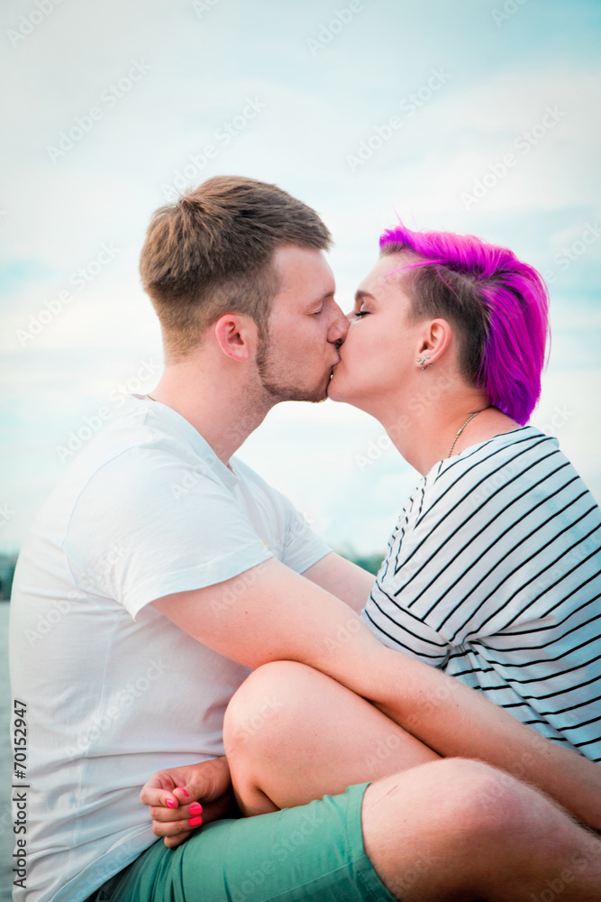 Young couple hugging and kissing Young couple hugging and kissing