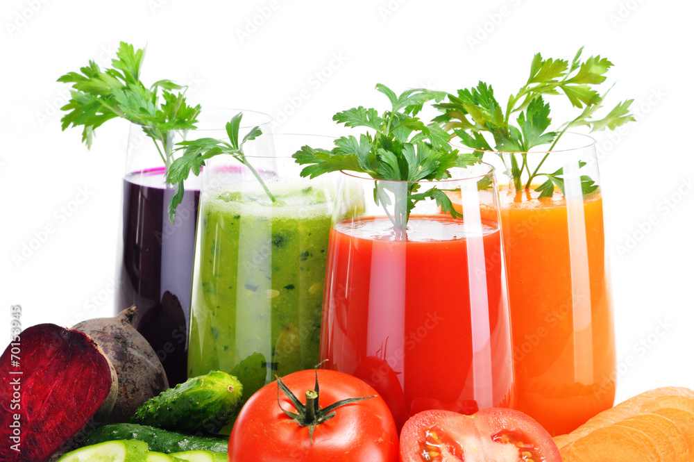 Glasses with fresh vegetable juices isolated on white Glasses with fresh vegetable juices isolated on white