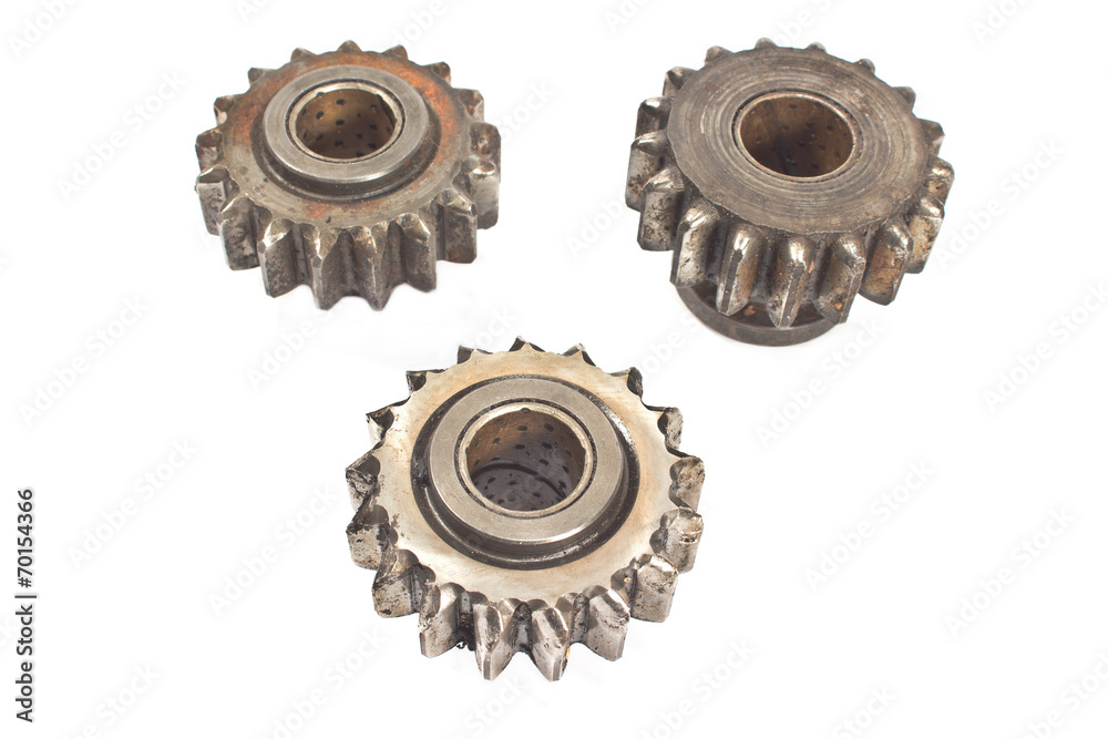 Old metal cogs isolated on white Old metal cogs isolated on white