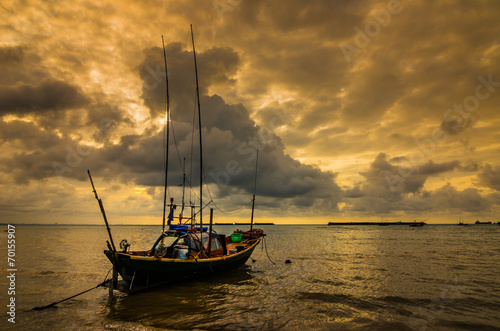 Fishing sea boat and Sunrise