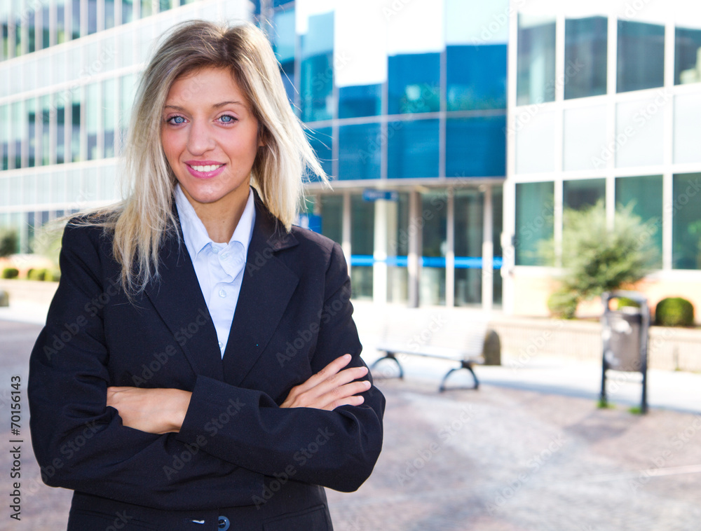 Portrait of a young confident business woman smiling Portrait of a young confident business woman smiling