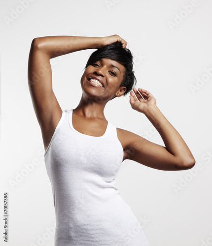 happy latin woman in a blank sleeveless t-shirt