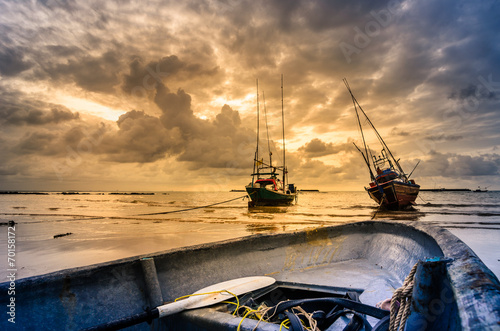 Fishing sea boat and Sunrise