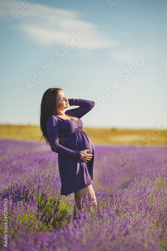 A pregnant woman is enjoying the color Lavender