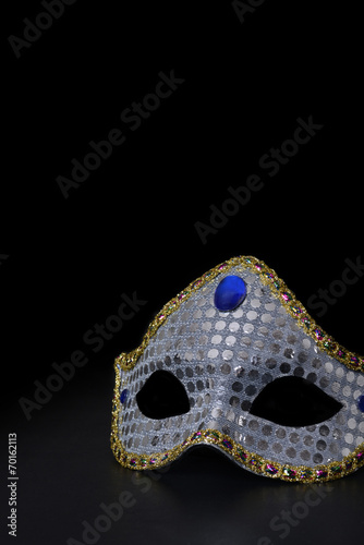 silver mask on black © Michael Gray