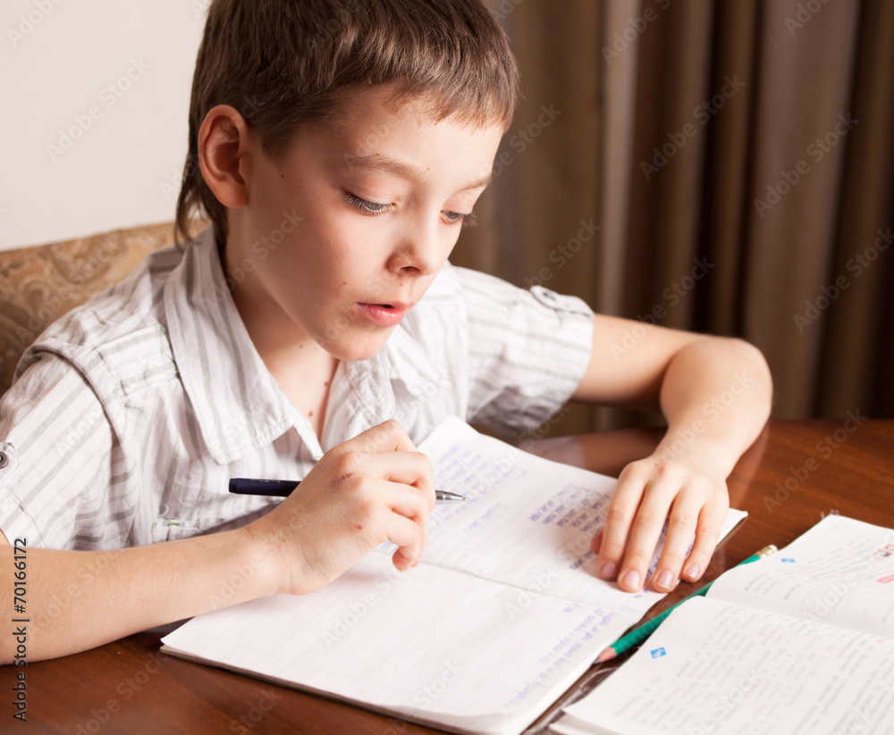 Boy doing homework Boy doing homework