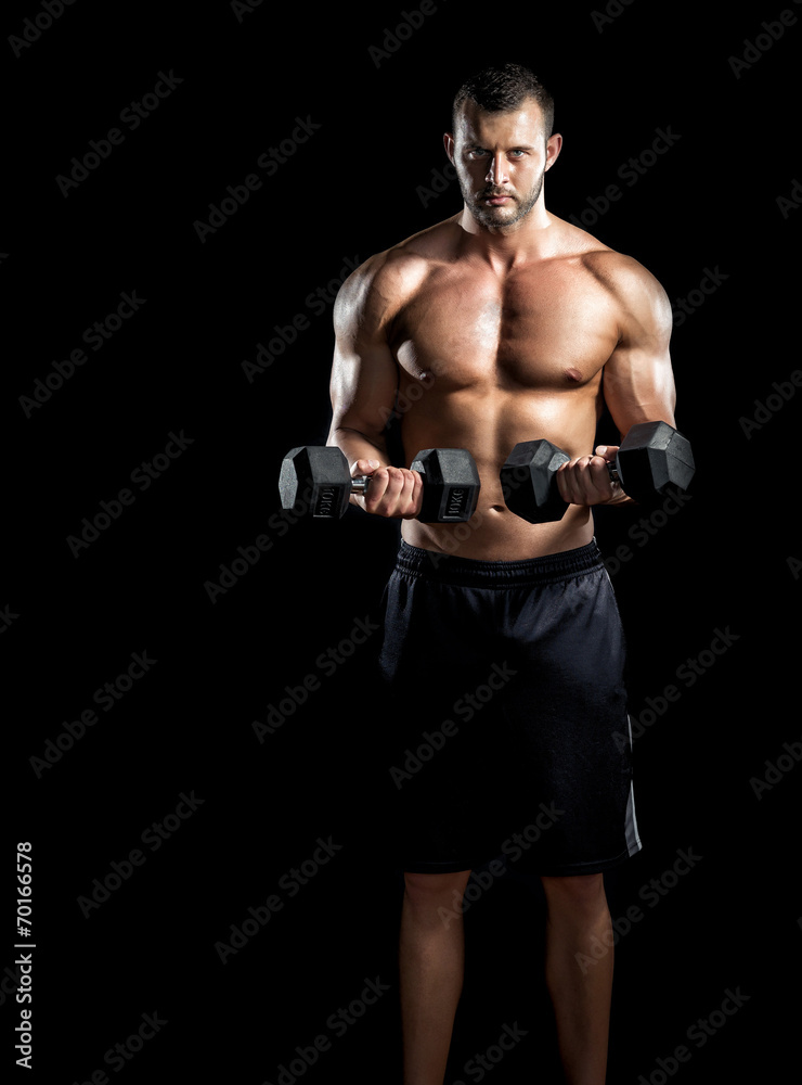 Man doing biceps curls in gym. Man doing biceps curls in gym.