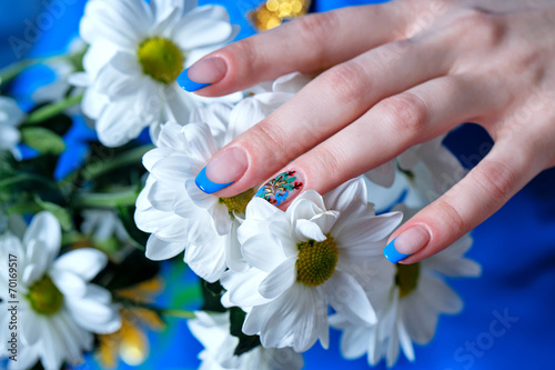 Female hands with flowers